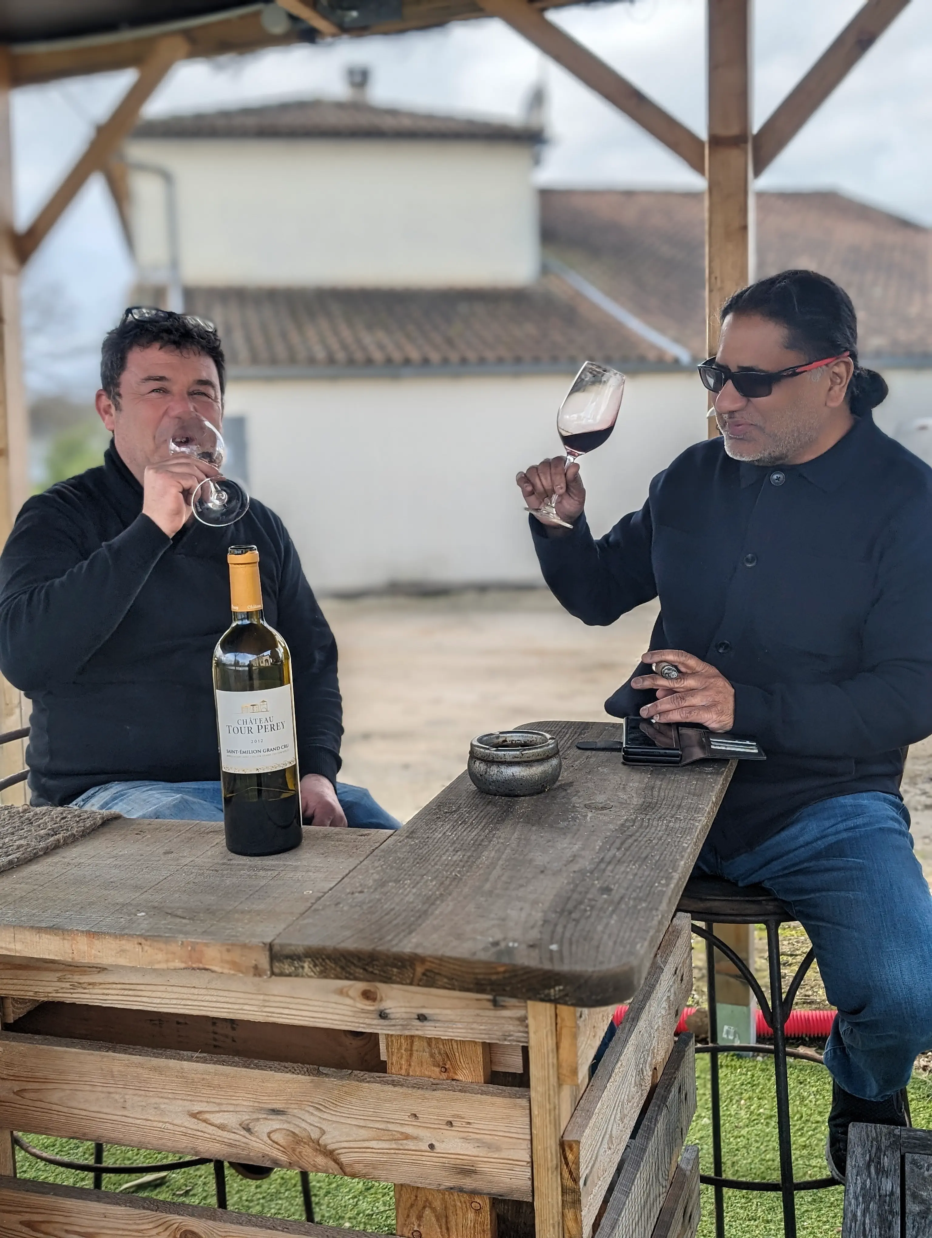 Kunal Mittal tasting Bordeaux wine with winemaker Jean Luc in Saint-Émilion