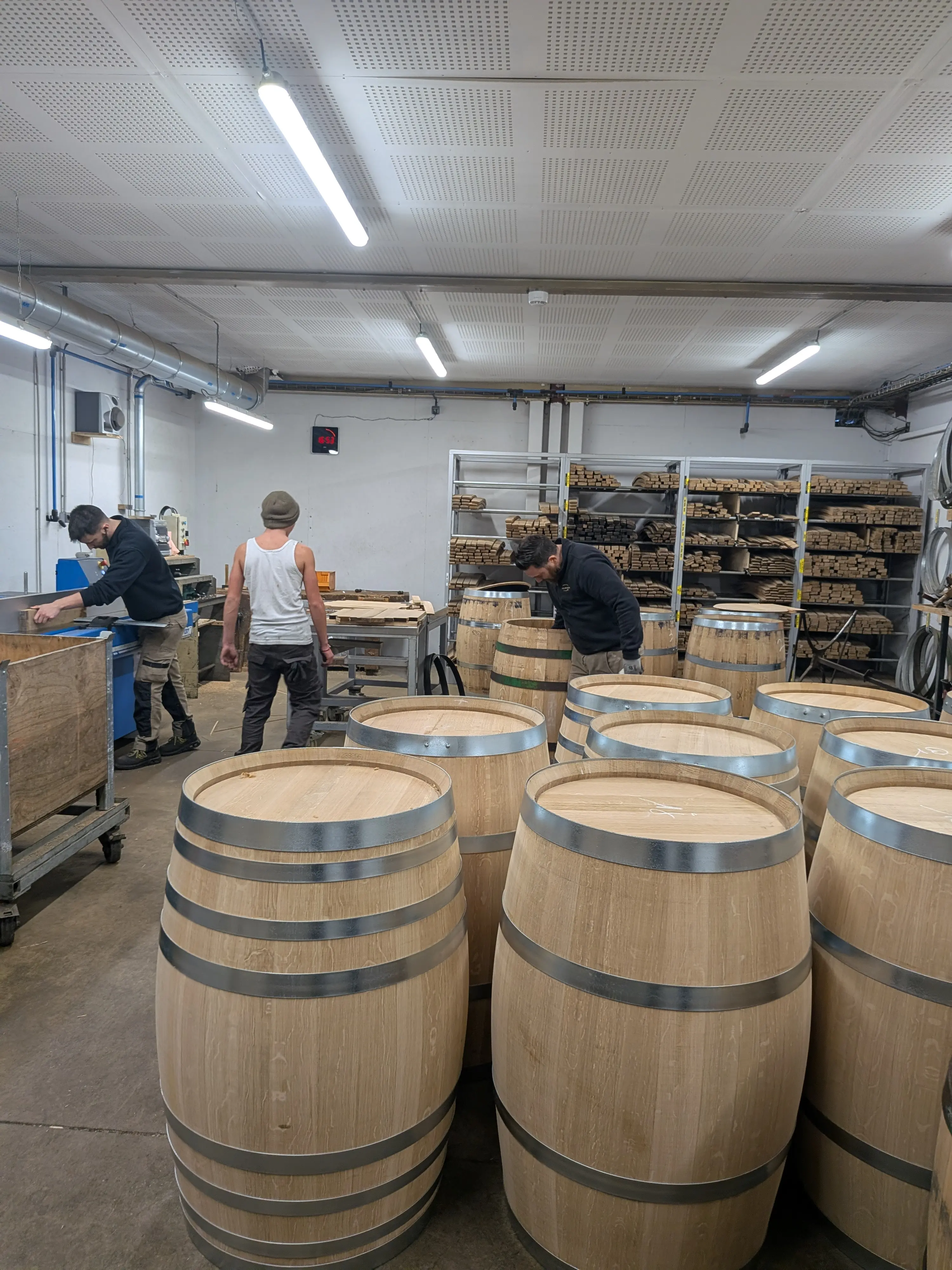French oak wine barrels being made and toasted at Tonnellerie Baron near Bordeaux