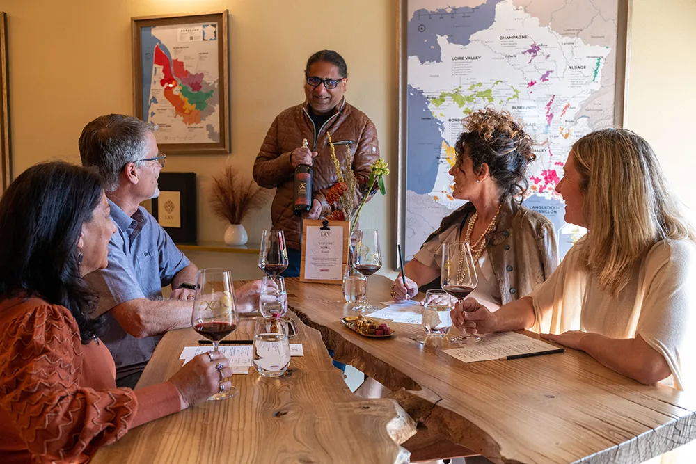 Kunal Mittal hosting a guided wine and spice tasting at the LXV tasting room in downtown Paso Robles